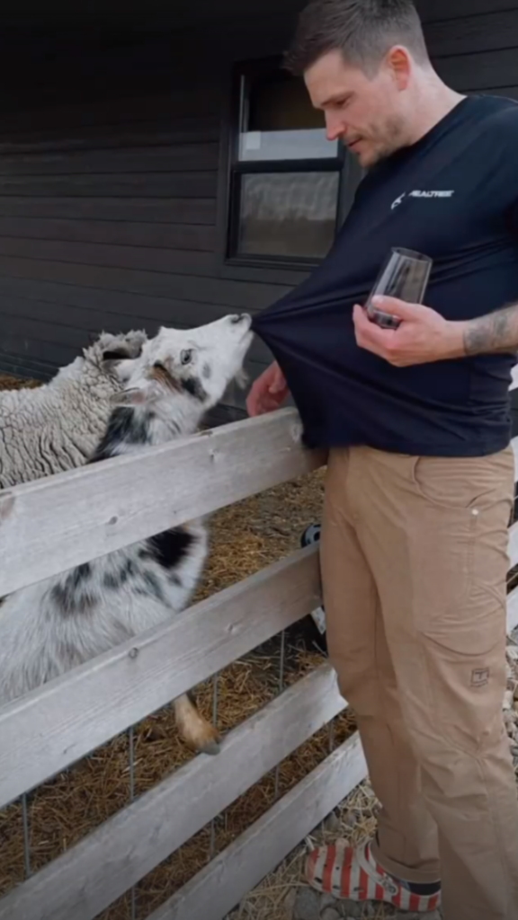 Cole with goats