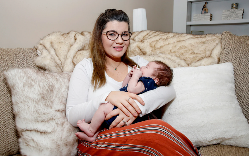 Amber with newborn James