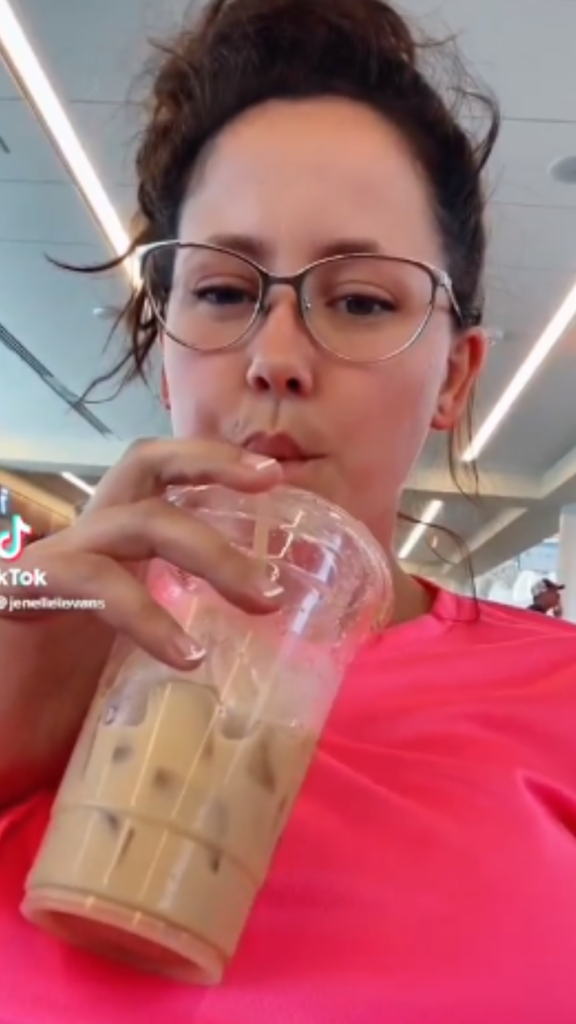 Jenelle with iced coffee